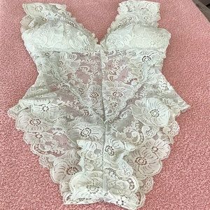 White lace bodysuit